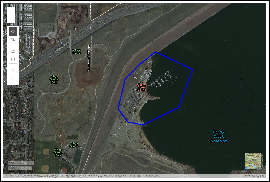 Screenshot of TRACS mapper with a lake displayed and the location mapped with a polygon shape around the marina area